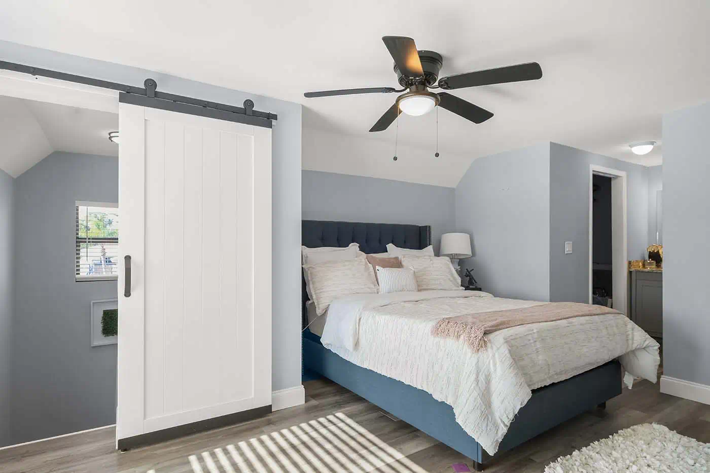 Bedroom in Fort Myers FL home for sale at 17495 Ellie Dr with natural light